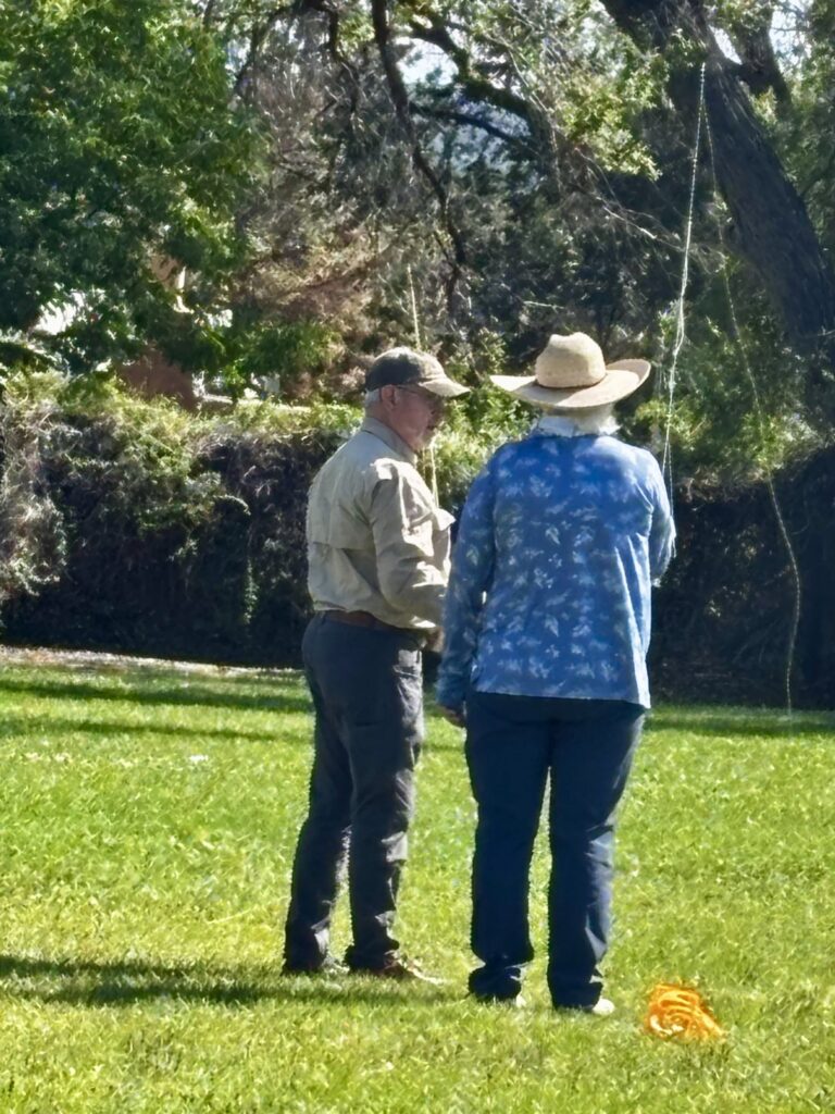 Instructor and participant talking during the casting clinic